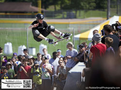 Tony hawk, Andy Macdonald, and other professional skateboarders at the ann arbor skatepark grand opening in ann arbor, michigan